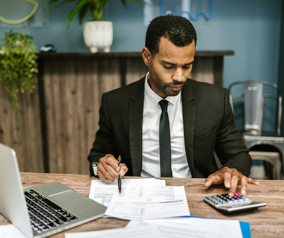 man reviewing financial documents to understand what happens after a credit dispute is filed